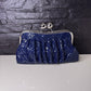Clutch brillo azul marino