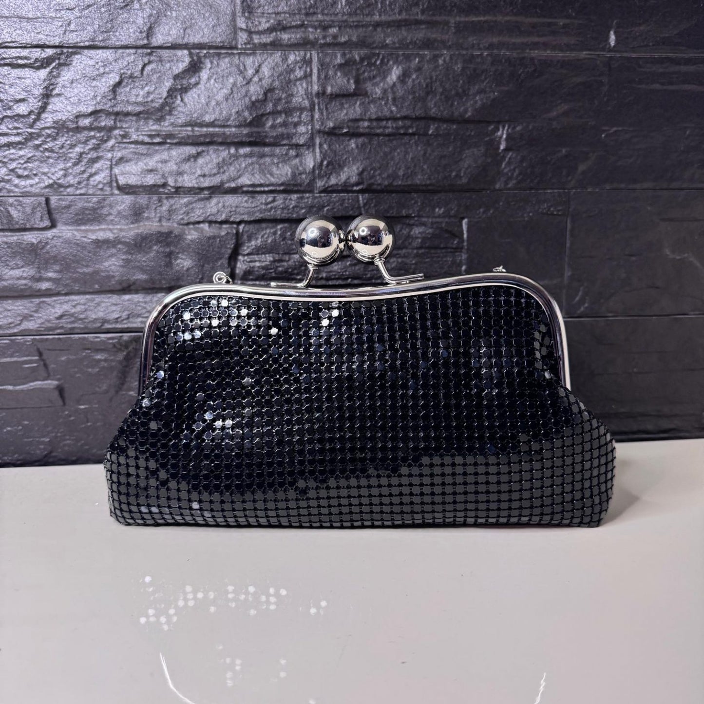 Clutch brillo negro