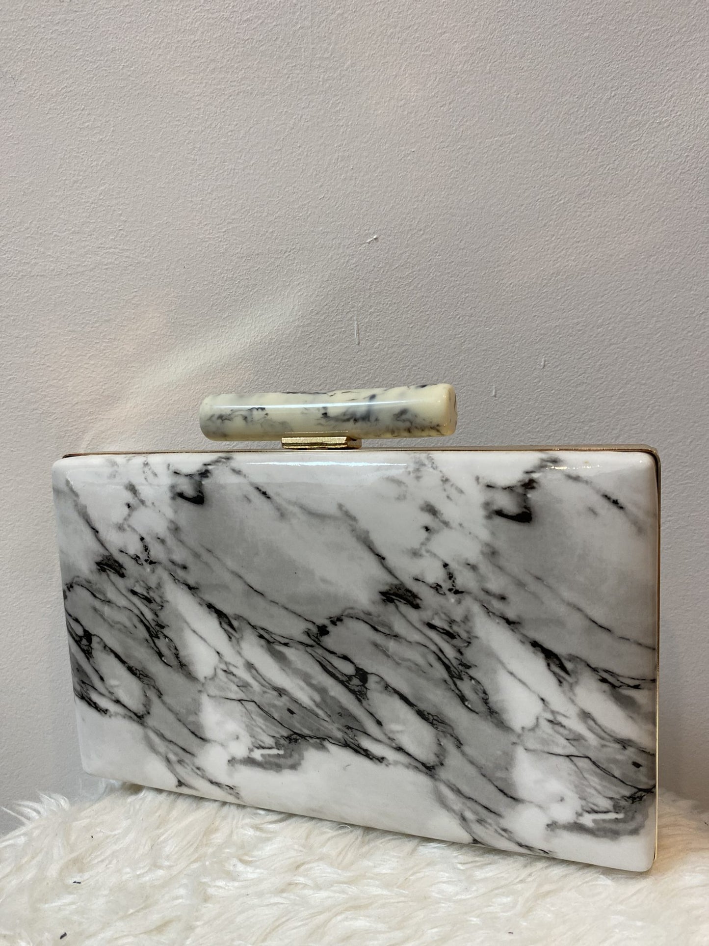 Clutch efecto mármol